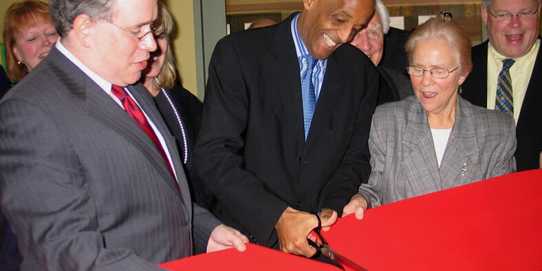 Ribbon cutting ceremony with Encore's board of directors